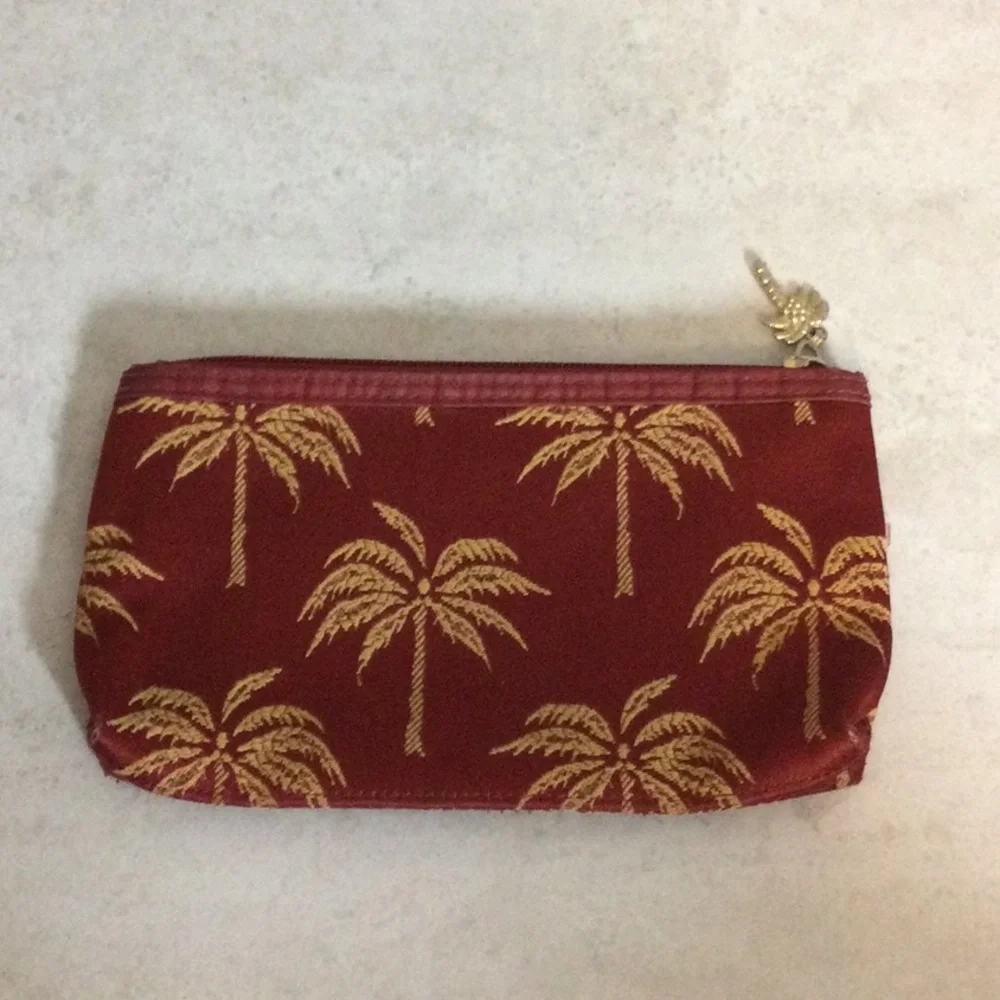 Celebrity Gold Palm-Print Pouch in Burgundy